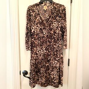 Kasper leopard print faux wrap dress in a lovely non wrinkle knit. Fits 8-10 M